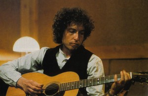 Playing a Bob Dylan song is a great way to warm up for acoustic players. 